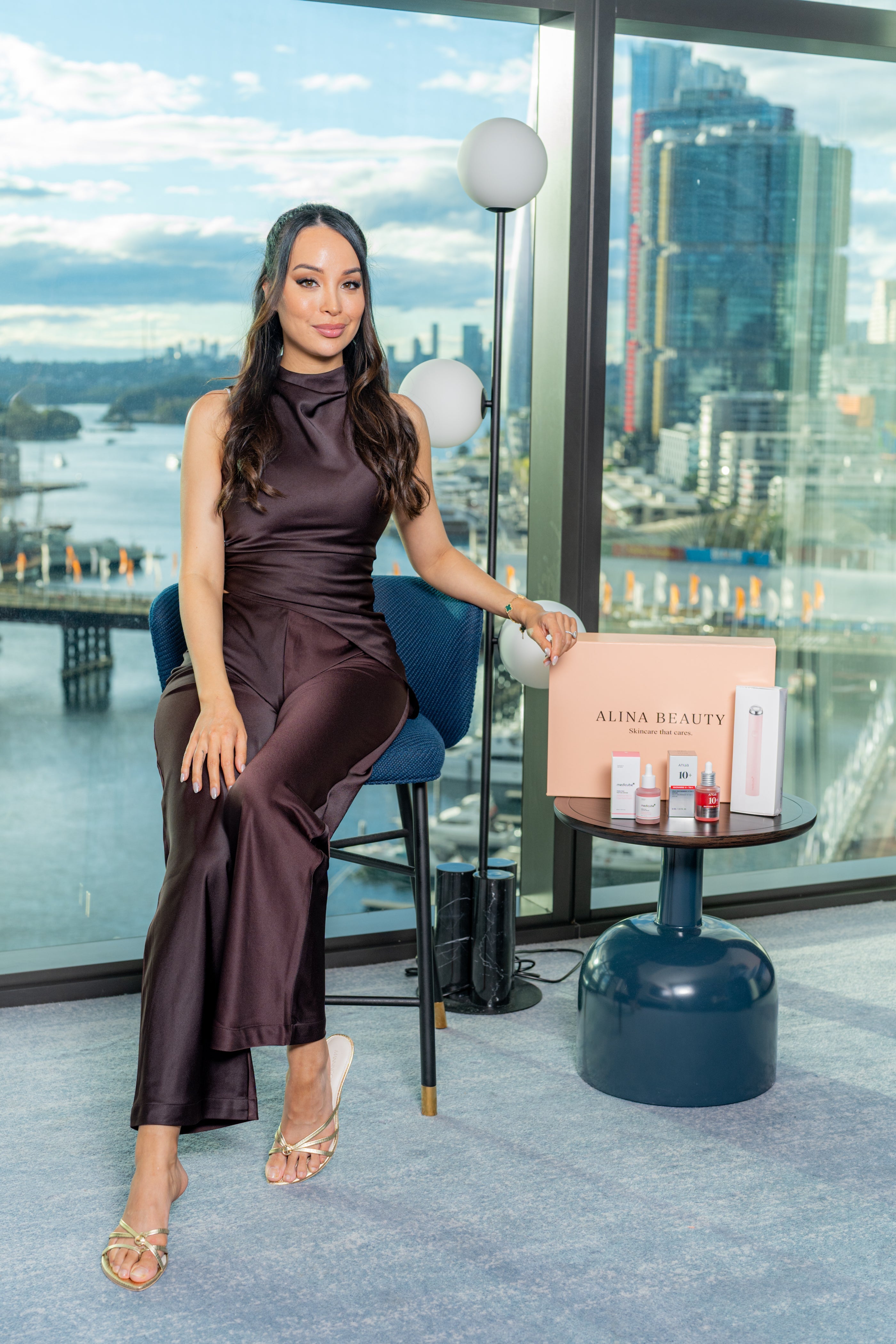 Edwina, founder of Alina Beauty, with The 4-Minute Ritual — her complete routine in one box