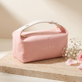 The Alina Beauty Bag in blush pink 100% cotton canvas with cream webbing handle and gold zip