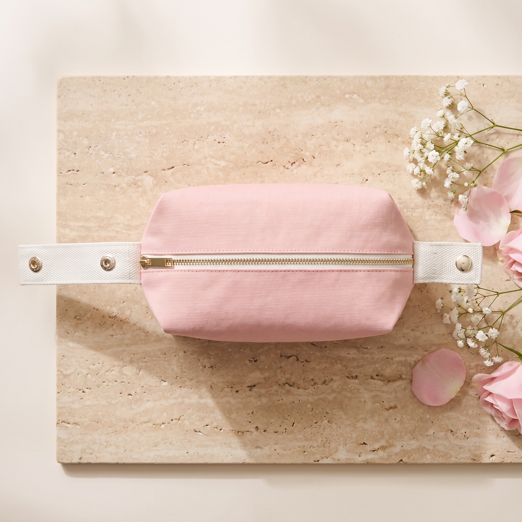 Alina Beauty Bag top-down flat lay in blush pink cotton canvas